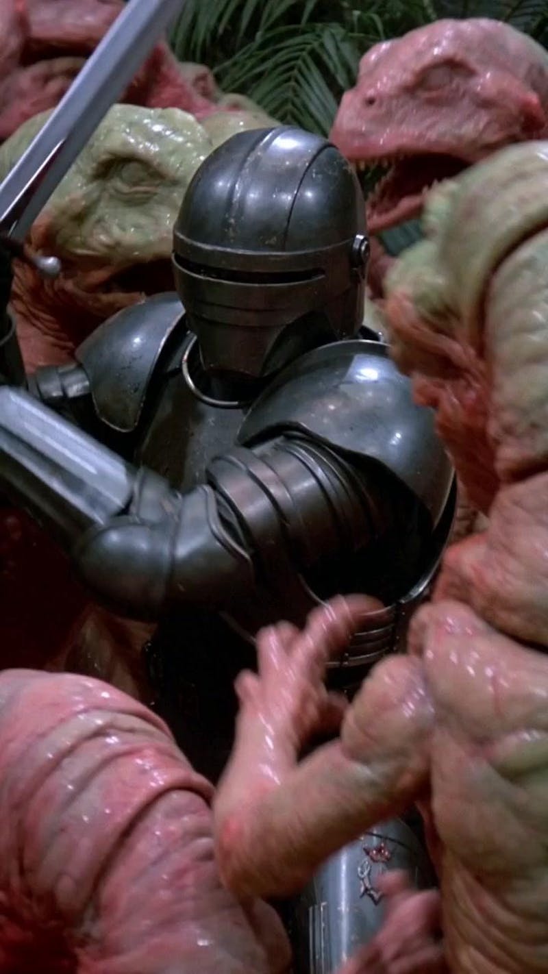 A late-1970s / early-1980s fantasy action scene, shot on 35mm film with